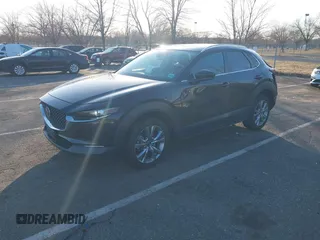 2023 Mazda CX-30 2.5 S Select Package with VIN 3MVDMBBM3PM584854, listed as a IAAI auction lot 41736925 with 39,008 mi miles. Bid and sale history available at carsss.com. Image 17.