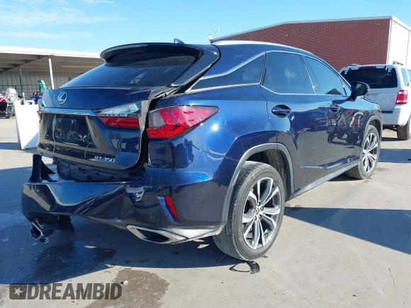 2018 Lexus RX with VIN 2T2ZZMCA1JC102452, listed as a IAAI auction lot 41598215 with 80,161 mi miles. Bid and sale history available at carsss.com. Image 4.