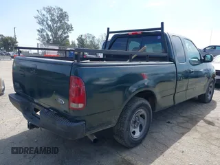 2003 Ford F-150 XL with VIN 1FTRX17263NB88093, listed as a IAAI auction lot 41772955 with 1 mi miles. Bid and sale history available at carsss.com. Image 4.