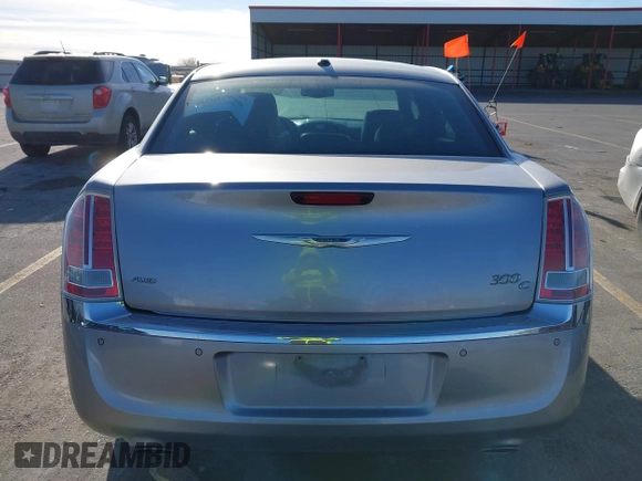 2014 Chrysler 300 C with VIN 2C3CCAKG3EH212936, listed as a IAAI auction lot 40921649 with 153,000 mi miles and . Bid and sale history available at carsss.com. Image 16.