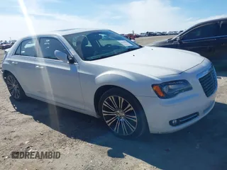 2013 Chrysler 300 with VIN 2C3CCABGXDH699096, listed as a IAAI auction lot 41614034 with 136,344 mi miles. Bid and sale history available at carsss.com. Image 1.
