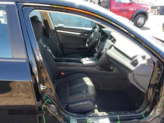 2020 Honda Civic LX with VIN 2HGFC2F69LH532499, listed as a IAAI auction lot 41919941 with 96,936 mi miles and . Bid and sale history available at DreamBid. Image 5.