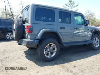 2022 Jeep Wrangler Unlimited Sahara with VIN 1C4HJXEM7NW206585, listed as a IAAI auction lot 42102516 with 10,769 mi miles and . Bid and sale history available at DreamBid. Image 4.