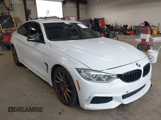 2015 BMW 4 Series 435i xDrive with VIN WBA4B3C53FD669771, listed as a IAAI auction lot 41835401 with 145,570 mi miles and . Bid and sale history available at DreamBid. Image 1.