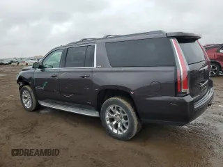 2015 GMC Yukon XL SLT with VIN 1GKS2HKC6FR122492, listed as a Copart auction lot 51757795 with 172,427 mi miles and Salvage Title. Bid and sale history available at carsss.com. Image 2.