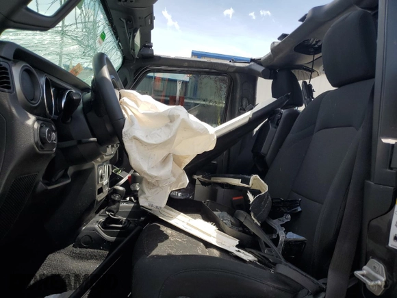 2019 Jeep Wrangler Sport S with VIN 1C4GJXAG4KW569059, listed as a Copart auction lot 60546945 with 57,131 mi miles and Non repairable. Bid and sale history available at DreamBid. Image 7.