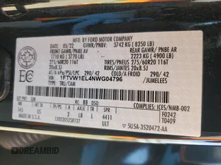 2022 Ford F-150 Lightning Pro z VIN 1FTVW1EL4NWG04796, wystawiony jako Copart lot #49850605 z przebiegiem 36 654 mil mil oraz Czysty tytuł • Clean title. Historia ofert i sprzedaży dostępna na DreamBid. Obrazek 13.