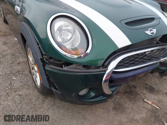 2015 MINI Hardtop 4 Door S with VIN WMWXU3C5XF2B59066, listed as a IAAI auction lot 40900773 with 14,618 mi miles and . Bid and sale history available at DreamBid. Image 18.