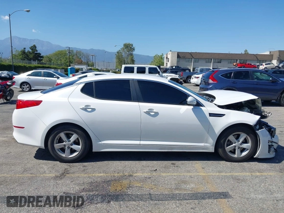 2015 Kia Optima LX z VIN KNAGM4A71F5594595, wystawiony jako IAAI lot #42226773 z przebiegiem 133 194 mil mil oraz . Historia ofert i sprzedaży dostępna na DreamBid. Obrazek 13.