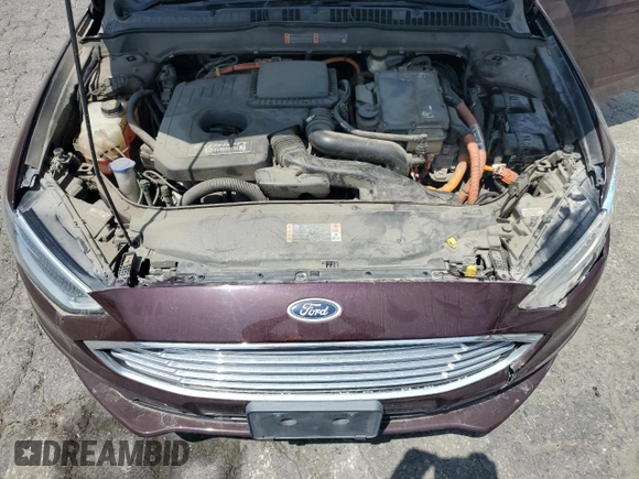 2017 Ford Fusion Titanium z VIN 3FA6P0SU8HR313773, wystawiony jako Copart lot #58791695 z przebiegiem 141 777 mil mil oraz Czysty tytuł • Clean title. Historia ofert i sprzedaży dostępna na DreamBid. Obrazek 11.