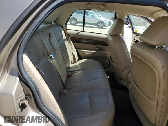 2005 Mercury Grand Marquis LS Premium z VIN 2MEFM75W95X642339, wystawiony jako Copart lot #50391035 z przebiegiem 127 526 mil mil oraz Szkoda całkowita • Salvage title. Historia ofert i sprzedaży dostępna na DreamBid. Obrazek 11.