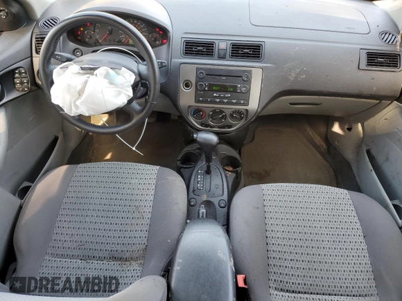 2007 Ford Focus SE with VIN 1FAFP36N87W183509, listed as a Copart auction lot 54649255 with 156,260 mi miles and Salvage title. Bid and sale history available at DreamBid. Image 8.