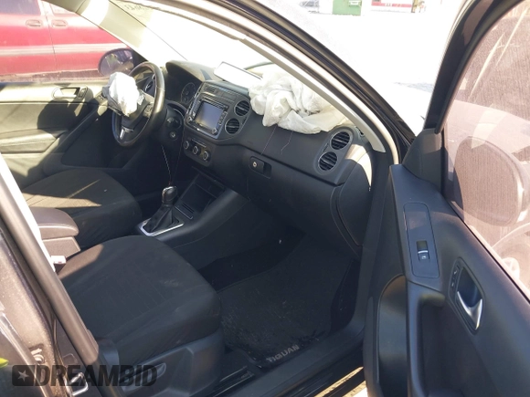 2012 Volkswagen Tiguan SE with VIN WVGAV7AX8CW565863, listed as a IAAI auction lot 41528643 with 122,569 mi miles and . Bid and sale history available at DreamBid. Image 5.