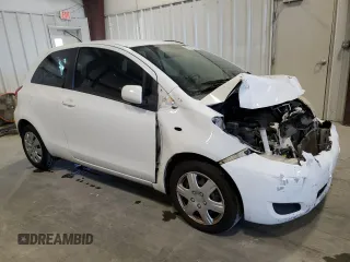 2011 Toyota Yaris with VIN JTDJT4K30B5334173, listed as a Copart auction lot 87031624 with 179,280 mi miles and Salvage Title. Bid and sale history available at carsss.com. Image 4.