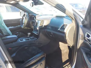 2017 Jeep Grand Cherokee Trailhawk with VIN 1C4RJFLT4HC657682, listed as a IAAI auction lot 41286507 with 123,646 mi miles and . Bid and sale history available at DreamBid. Image 5.