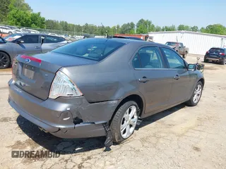 2012 Ford Fusion SE z VIN 3FAHP0HA4CR232641, wystawiony jako IAAI lot #42057070 z przebiegiem 180 793 mil mil oraz . Historia ofert i sprzedaży dostępna na DreamBid. Obrazek 6.
