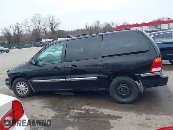 1999 Ford Windstar SE with VIN 2FMDA5243XBC41132, listed as a IAAI auction lot 41575559 with 240,497 mi miles and . Bid and sale history available at carsss.com. Image 14.
