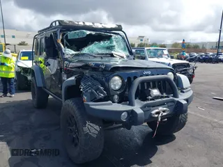 2014 Jeep Wrangler Unlimited Rubicon with VIN 1C4BJWFGXEL172622, listed as a IAAI auction lot 41782796 with 67,594 mi miles. Bid and sale history available at carsss.com. Image 14.