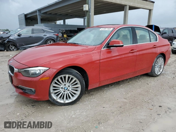 2014 BMW 3 Series 328i xDrive with VIN WBA3B3C59EJ977670, listed as a Copart auction lot 61997165 with 128,937 mi miles and Salvage title. Bid and sale history available at DreamBid. Image 1.