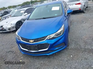 2016 Chevrolet Cruze LT z VIN 1G1BE5SM5G7321470, wystawiony jako IAAI lot #40456371 z przebiegiem 90 350 mil mil oraz . Historia ofert i sprzedaży dostępna na DreamBid. Obrazek 12.