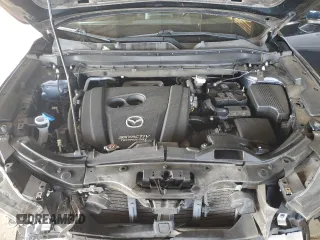 2019 Mazda CX-5 Grand Touring with VIN JM3KFADM3K1539890, listed as a Copart auction lot 57809835 with 56,079 mi miles and Salvage title. Bid and sale history available at DreamBid. Image 12.