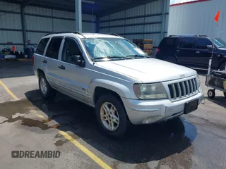 2004 Jeep Grand Cherokee Laredo with VIN 1J4GX48S34C258227, listed as a IAAI auction lot 42616107 with 160,424 mi miles and . Bid and sale history available at DreamBid. Image 1.
