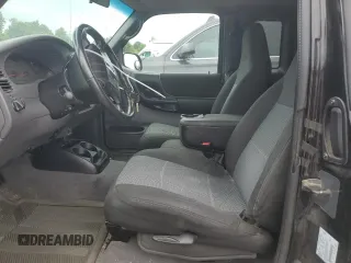 2003 Ford Ranger XL Fleet with VIN 1FTYR44U33PB76954, listed as a Copart auction lot 59866174 with 180,629 mi miles and Salvage Title. Bid and sale history available at DreamBid. Image 7.