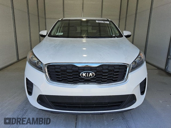 2019 Kia Sorento LX z VIN 5XYPG4A54KG482528, wystawiony jako Copart lot #55098735 z przebiegiem 128 821 mil mil oraz Czysty tytuł • Clean title. Historia ofert i sprzedaży dostępna na DreamBid. Obrazek 5.