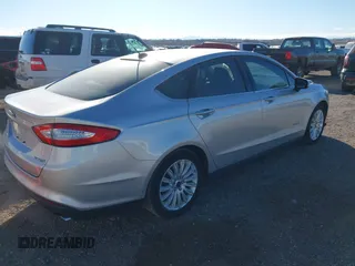 2015 Ford Fusion S Hybrid with VIN 3FA6P0UU0FR307900, listed as a IAAI auction lot 41507112 with 150,257 mi miles. Bid and sale history available at carsss.com. Image 4.