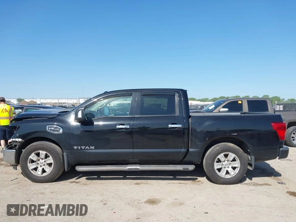 2017 Nissan Titan SV with VIN 1N6AA1E68HN535917, listed as a IAAI auction lot 41974261 with 162,561 mi miles and . Bid and sale history available at DreamBid. Image 15.