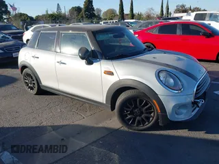 2017 MINI Hardtop 4 Door Cooper with VIN WMWXU1C37H2F77364, listed as a IAAI auction lot 41331028 with 1 mi miles. Bid and sale history available at carsss.com. Image 1.