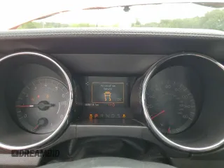 2015 Ford Mustang V6 z VIN 1FA6P8AM6F5388679, wystawiony jako Copart lot #58469525 z przebiegiem 69 819 mil mil oraz Szkoda całkowita • Salvage title. Historia ofert i sprzedaży dostępna na DreamBid. Obrazek 9.