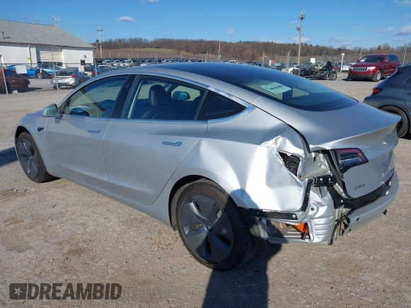2018 Tesla Model 3 Long Range Battery with VIN 5YJ3E1EB9JF065057, listed as a IAAI auction lot 41863903 with 54,584 mi miles and . Bid and sale history available at DreamBid. Image 3.