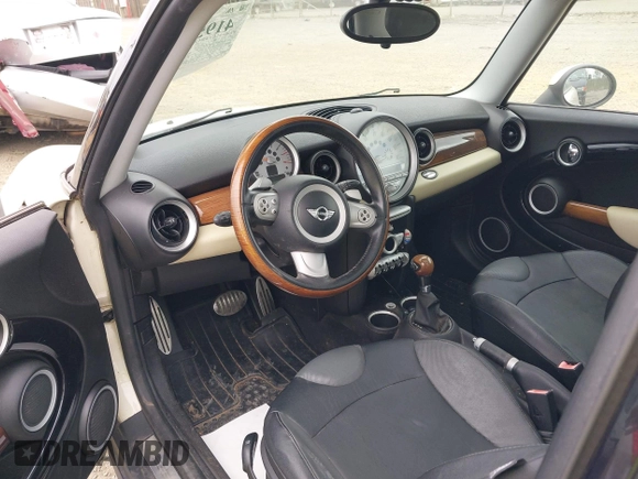 2007 MINI Hardtop S with VIN WMWMF73527TL89861, listed as a IAAI auction lot 41953013 with 111,222 mi miles and . Bid and sale history available at DreamBid. Image 5.