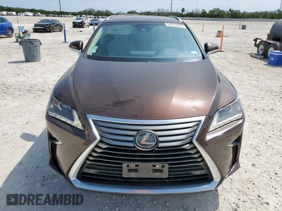 2017 Lexus RX 350 z VIN 2T2ZZMCA8HC077284, wystawiony jako Copart lot #57413725 z przebiegiem 70 616 mil mil oraz Czysty tytuł • Clean title. Historia ofert i sprzedaży dostępna na DreamBid. Obrazek 5.