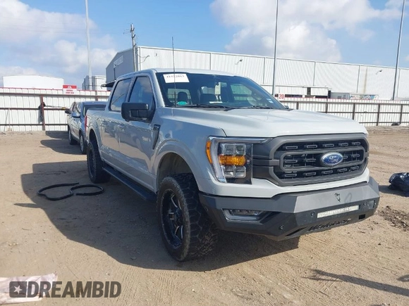 2023 Ford F-150 XL with VIN 1FTFW1E84PFA28761, listed as a IAAI auction lot 41532863 with 32,929 mi miles. Bid and sale history available at carsss.com. Image 1.