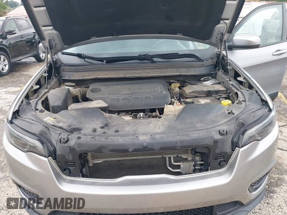 2020 Jeep Cherokee Latitude with VIN 1C4PJLCBXLD637338, listed as a IAAI auction lot 42471556 with 69,191 mi miles and . Bid and sale history available at DreamBid. Image 10.