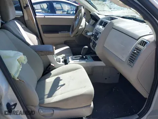 2010 Mercury Mariner with VIN 4M2CN8BG7AKJ01706, listed as a IAAI auction lot 41701667 with 96,189 mi miles. Bid and sale history available at carsss.com. Image 5.