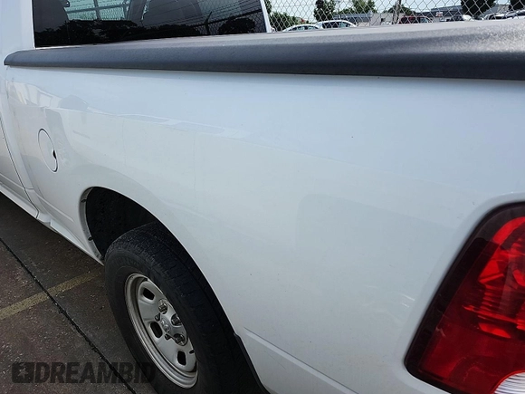 2013 Ram 1500 Tradesman z VIN 1C6RR6FP9DS560721, wystawiony jako IAAI lot #42598892 z przebiegiem 224 498 mil mil oraz . Historia ofert i sprzedaży dostępna na DreamBid. Obrazek 5.