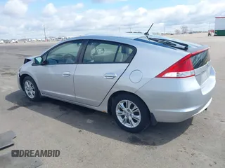 2010 Honda Insight EX with VIN JHMZE2H71AS017996, listed as a IAAI auction lot 42091356 with 142,474 mi miles and . Bid and sale history available at DreamBid. Image 3.