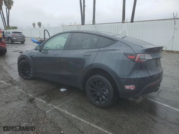 2024 Tesla Model Y with VIN 7SAYGDED5RF054851, listed as a Copart auction lot 42835055 with 14,695 mi miles and Salvage Title. Bid and sale history available at carsss.com. Image 2.