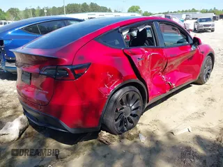2022 Tesla Model Y Performance with VIN 7SAYGDEFXNF513951, listed as a IAAI auction lot 41986001 with 37,225 mi miles and . Bid and sale history available at DreamBid. Image 4.