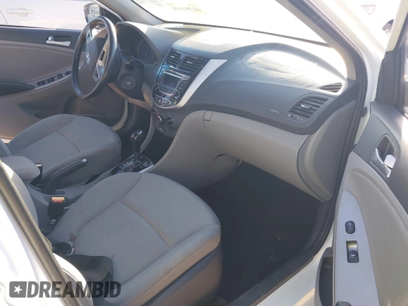 2015 Hyundai Accent Sport with VIN KMHCU5AE9FU205662, listed as a IAAI auction lot 41384496 with 80,133 mi miles. Bid and sale history available at carsss.com. Image 5.