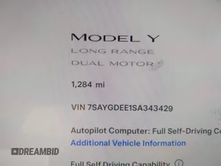 2025 Tesla Model Y Long Range with VIN 7SAYGDEE1SA343429, listed as a IAAI auction lot 41504455 with 1,284 mi miles and . Bid and sale history available at carsss.com. Image 7.