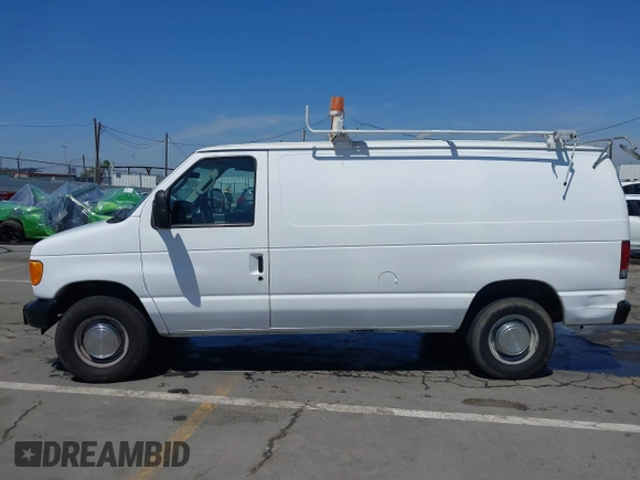 2006 Ford Econoline Cargo with VIN 1FTNE24L66HA64111, listed as a IAAI auction lot 41947445 with 205,025 mi miles and . Bid and sale history available at DreamBid. Image 13.