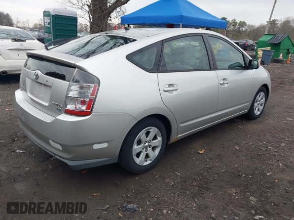 2005 Toyota Prius with VIN JTDKB20U853110933, listed as a IAAI auction lot 42049592 with 158,217 mi miles. Bid and sale history available at carsss.com. Image 4.