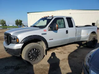 2006 Ford F-350 XL z VIN 1FTWX33PX6EC66136, wystawiony jako Copart lot #67257875 z przebiegiem 223 079 mil mil oraz Czysty tytuł • Clean title. Historia ofert i sprzedaży dostępna na DreamBid. Obrazek 1.