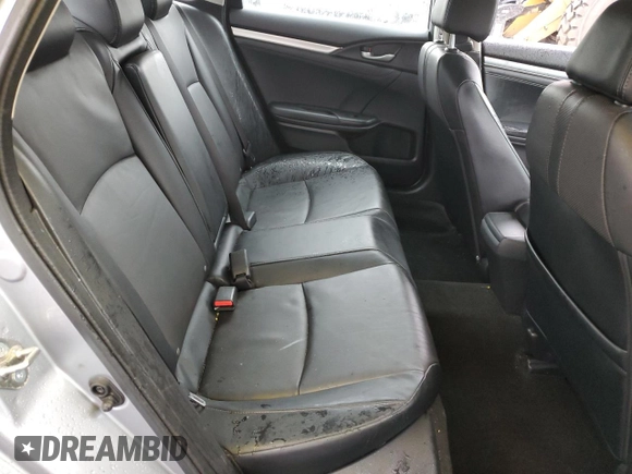 2017 Honda Civic EX-L z VIN 19XFC1F74HE209787, wystawiony jako Copart lot #56352415 z przebiegiem 130 264 mil mil oraz Szkoda całkowita • Salvage title. Historia ofert i sprzedaży dostępna na DreamBid. Obrazek 10.