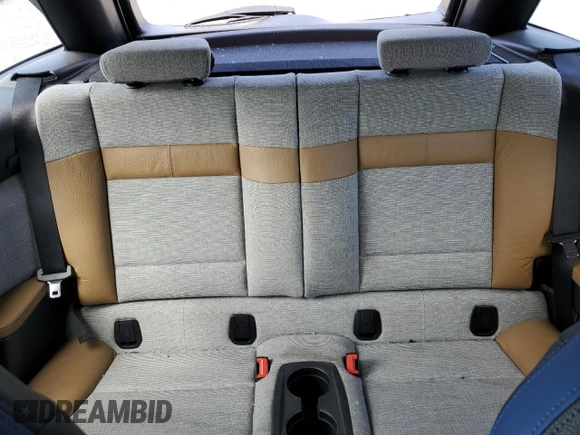 2017 BMW i3 z VIN WBY1Z8C32HV890898, wystawiony jako Copart lot #57968095 z przebiegiem 76 806 mil mil oraz Szkody całkowita. Historia ofert i sprzedaży dostępna na DreamBid. Obrazek 10.