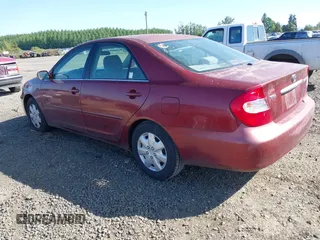 2003 Toyota Camry LE with VIN 4T1BE32K33U147710, listed as a IAAI auction lot 42184705 with 305,390 mi miles and . Bid and sale history available at DreamBid. Image 3.